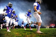 BENSALEM, PA - OCTOBER 21: Bensalem's Gerald Whea #7 and other Bensalem players take to the field of a Suburban One League National Conference football game against the Council Rock North Indians at Bensalem High School Oct. 21, 2016. Bensalem won 21-20. (Photo by Corey Perrine)