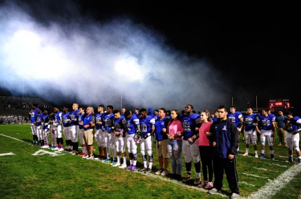 BENSALEM, PA - OCTOBER 21: Owls players stand at attention during the national anthem of a Suburban One League National Conference football game against the Council Rock North Indians at Bensalem High School Oct. 21, 2016. Bensalem won 21-20. (Photo by Corey Perrine)